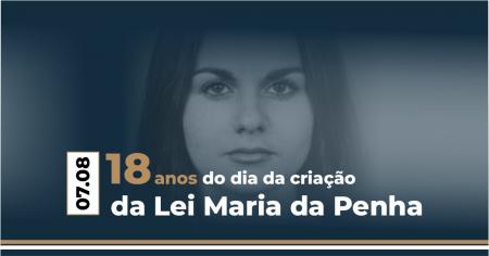 Foto: cartaz com informações sobre o aniversário da Lei Maria da Penha.